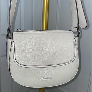 Grey leather Calvin Klein bag with coin pouch on strap
